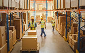 overhead view of a warehouse full of workers