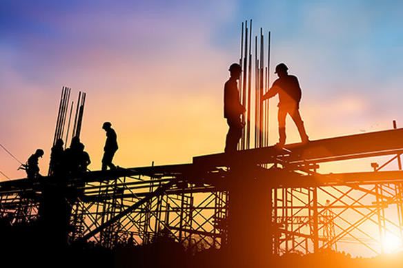 Construction workers building a structure