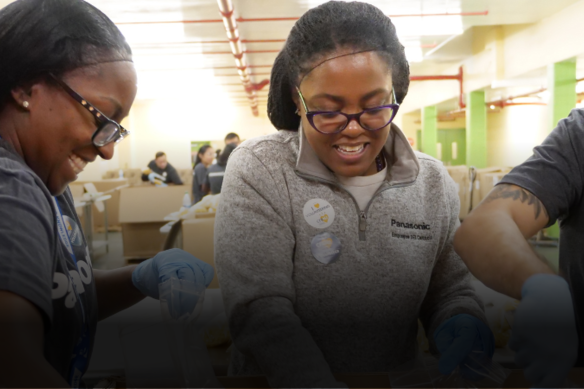 Panasonic employee volunteers working at the Community Food Bank of New Jersey